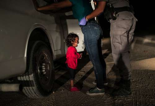 John Moore: Crying Girl on the Border