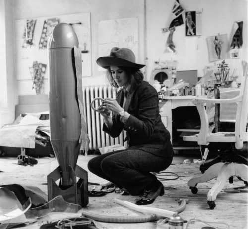 Kiki Kogelnik working on one of her Bomb sculptures in her studio in New York, 1965