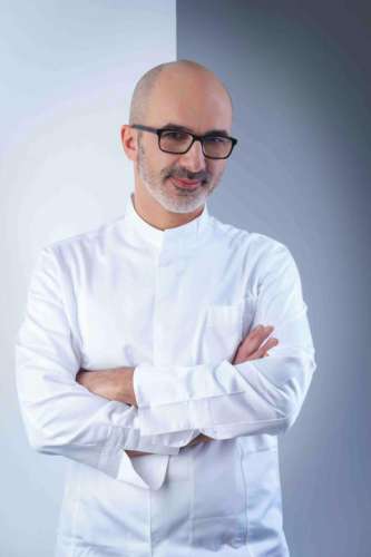 Cantinetta Antinori Küchenchef Lorenzo Dimartino mit weisser Kochjacke